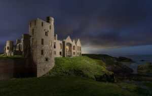 Night shot of Slains Castle using drone lights