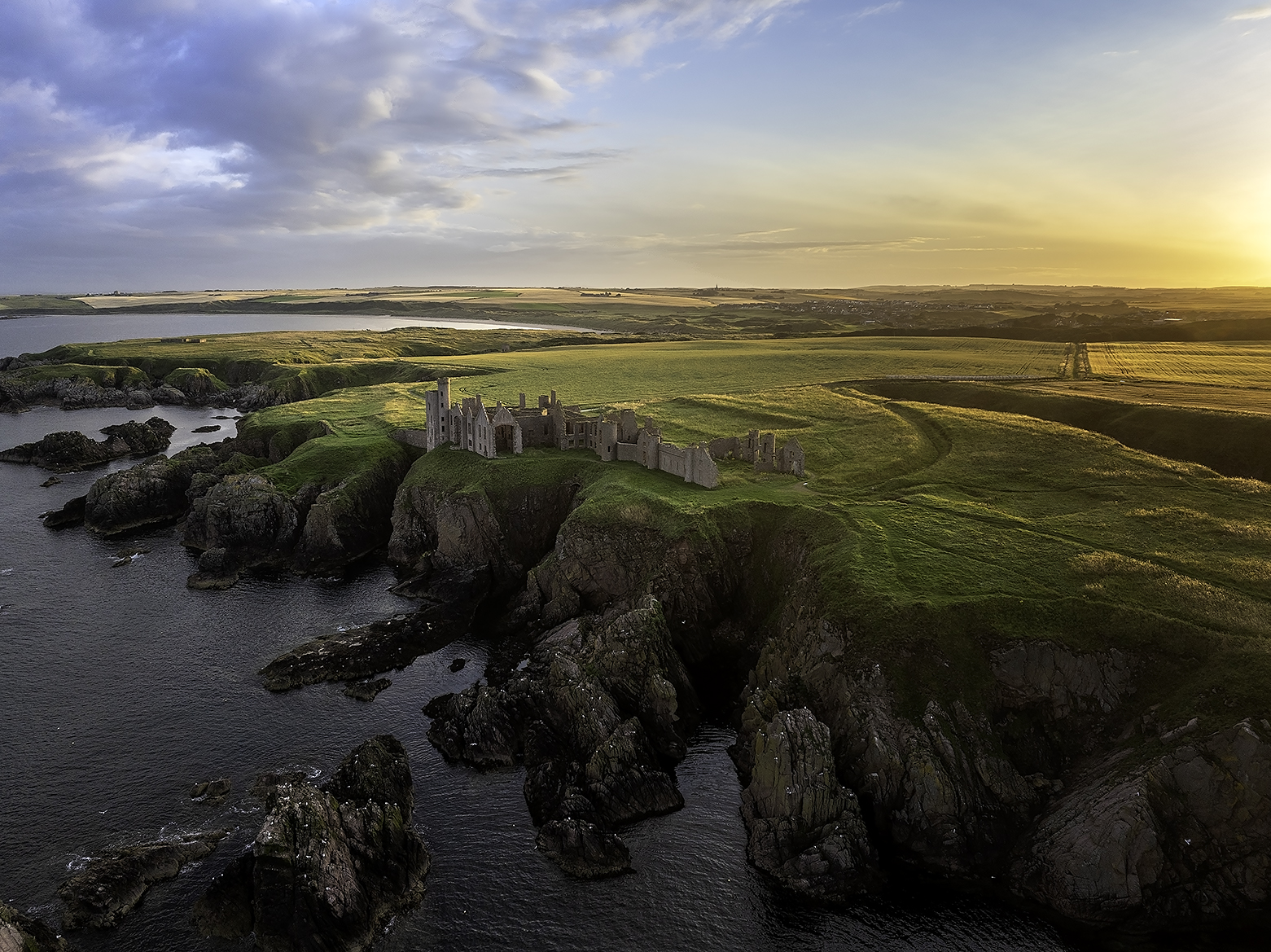 Slains Castle in golden afternoon light