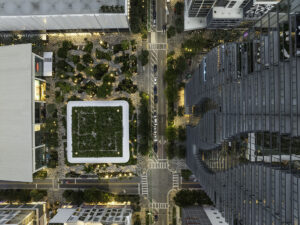 Drone plan view shot of Miami World Tower and Block at dusk